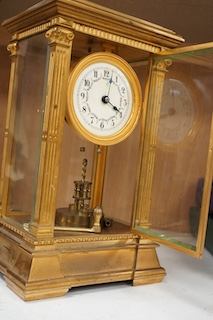 A large 19th century French four glass mantel clock, with key and pendulum, 37cm. Condition - fair to good, not tested